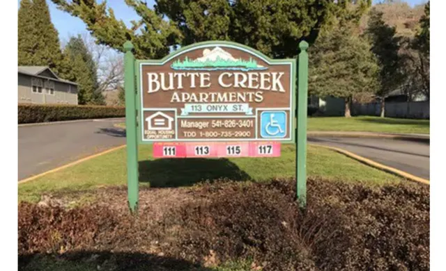 a sign on the side of the road