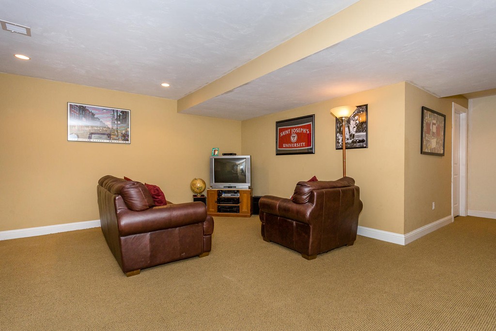 17 Endicott Street, Unit 17 Canton, MA 02021 - Photo 14 of 18 a living room with furniture and a couch