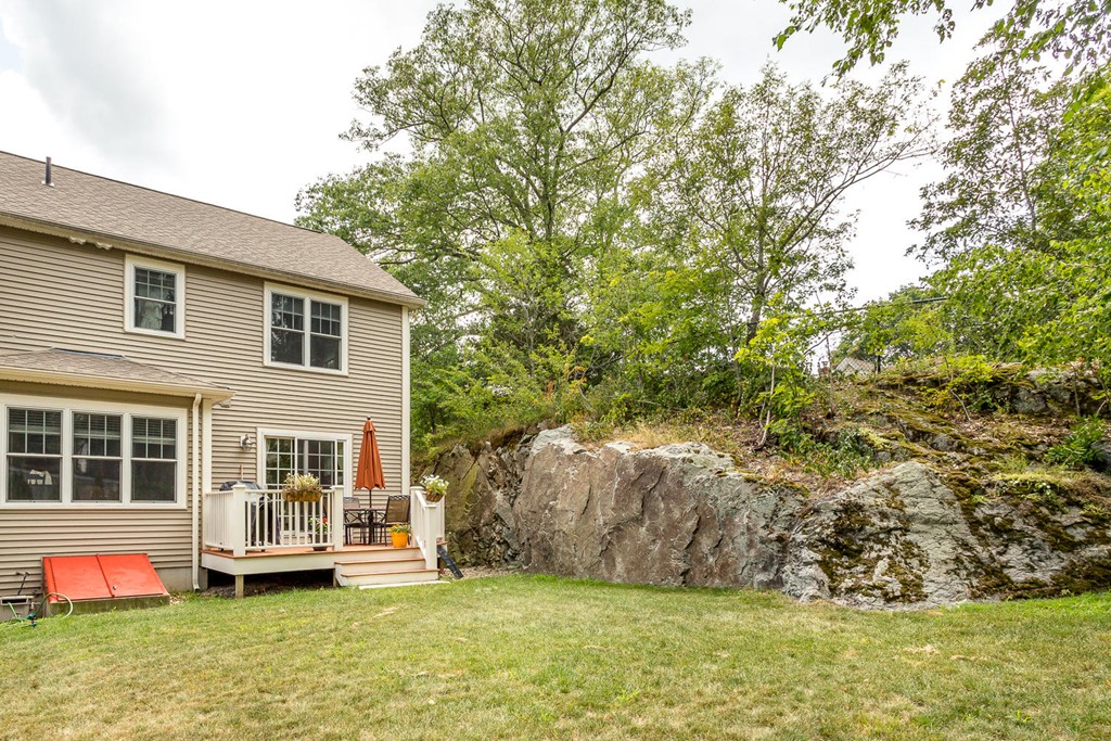 17 Endicott Street, Unit 17 Canton, MA 02021 - Photo 17 of 18 a front view of house with yard