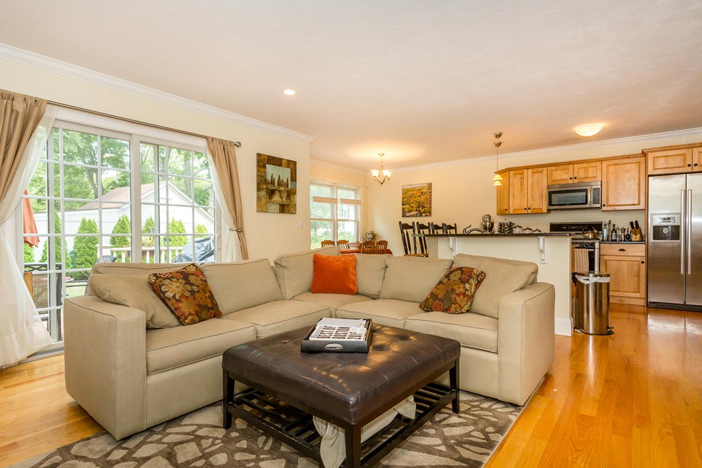 17 Endicott Street, Unit 17 Canton, MA 02021 - Photo 2 of 18 a living room with furniture and a large window