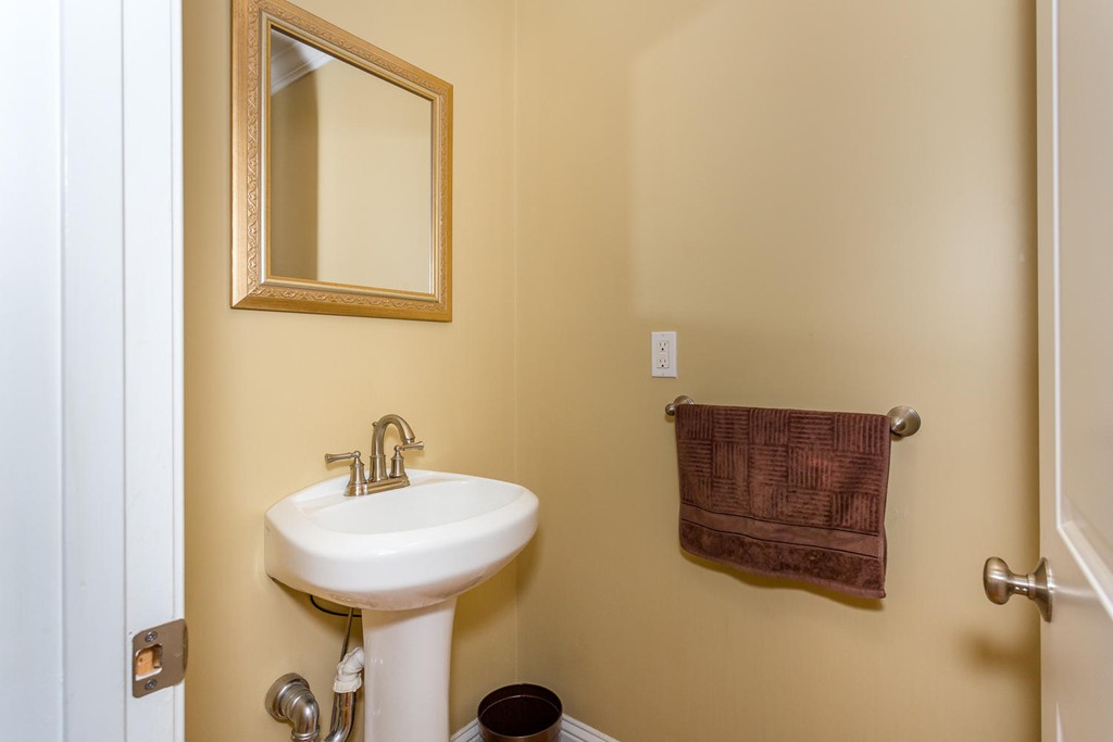 17 Endicott Street, Unit 17 Canton, MA 02021 - Photo 6 of 18 a bathroom with a sink and a mirror