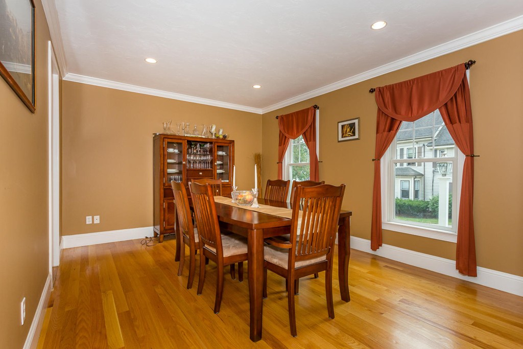 17 Endicott Street, Unit 17 Canton, MA 02021 - Photo 7 of 18 a view of a dining room with furniture and wooden floor