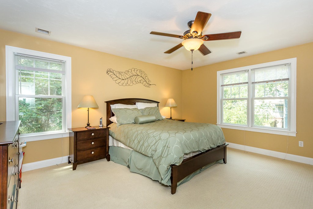 17 Endicott Street, Unit 17 Canton, MA 02021 - Photo 10 of 18 a spacious bedroom with a bed and window