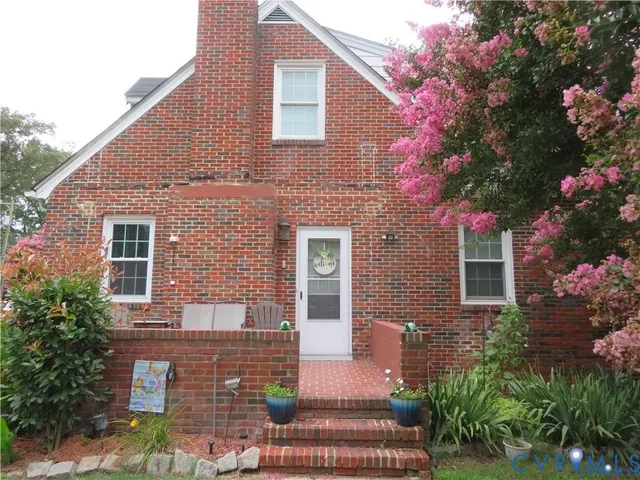 a view of a hallway view with staircase