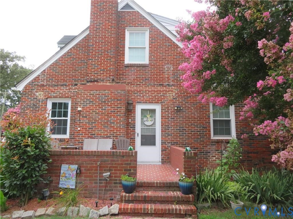 5900 River Road Petersburg, VA 23803 - Photo 14 of 44 a front view of a house with garden