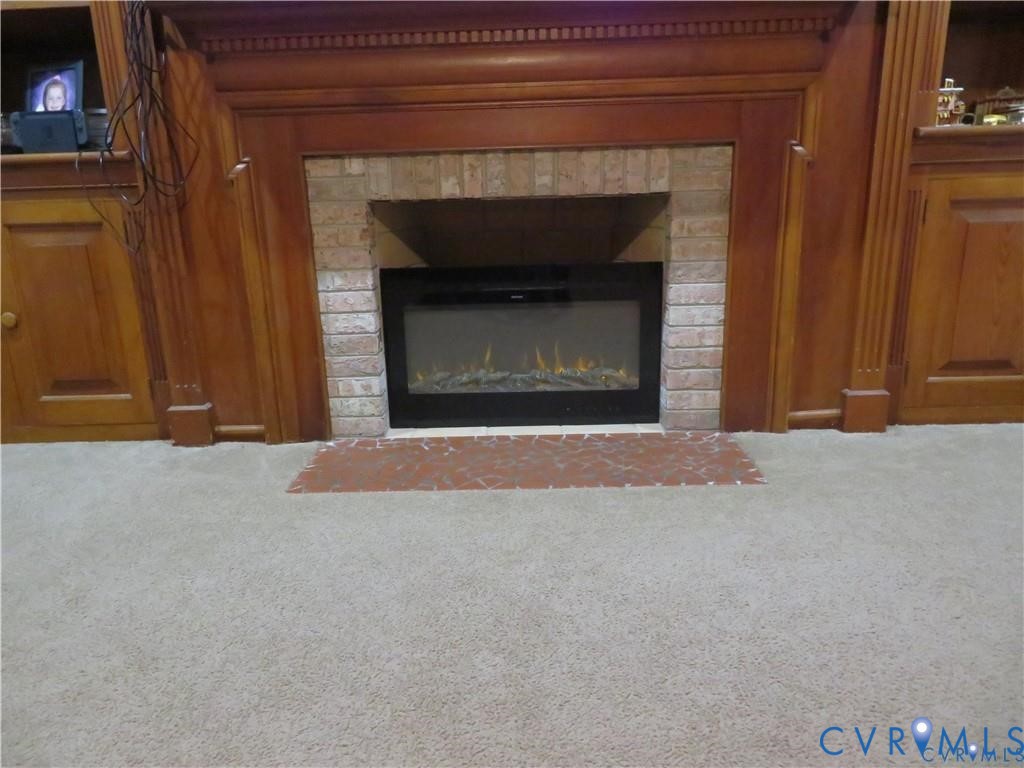 5900 River Road Petersburg, VA 23803 - Photo 20 of 44 a view of an empty room with a fireplace