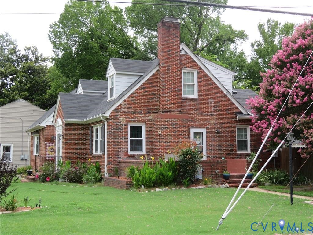 5900 River Road Petersburg, VA 23803 - Photo 2 of 44 a aerial view of a house next to a yard