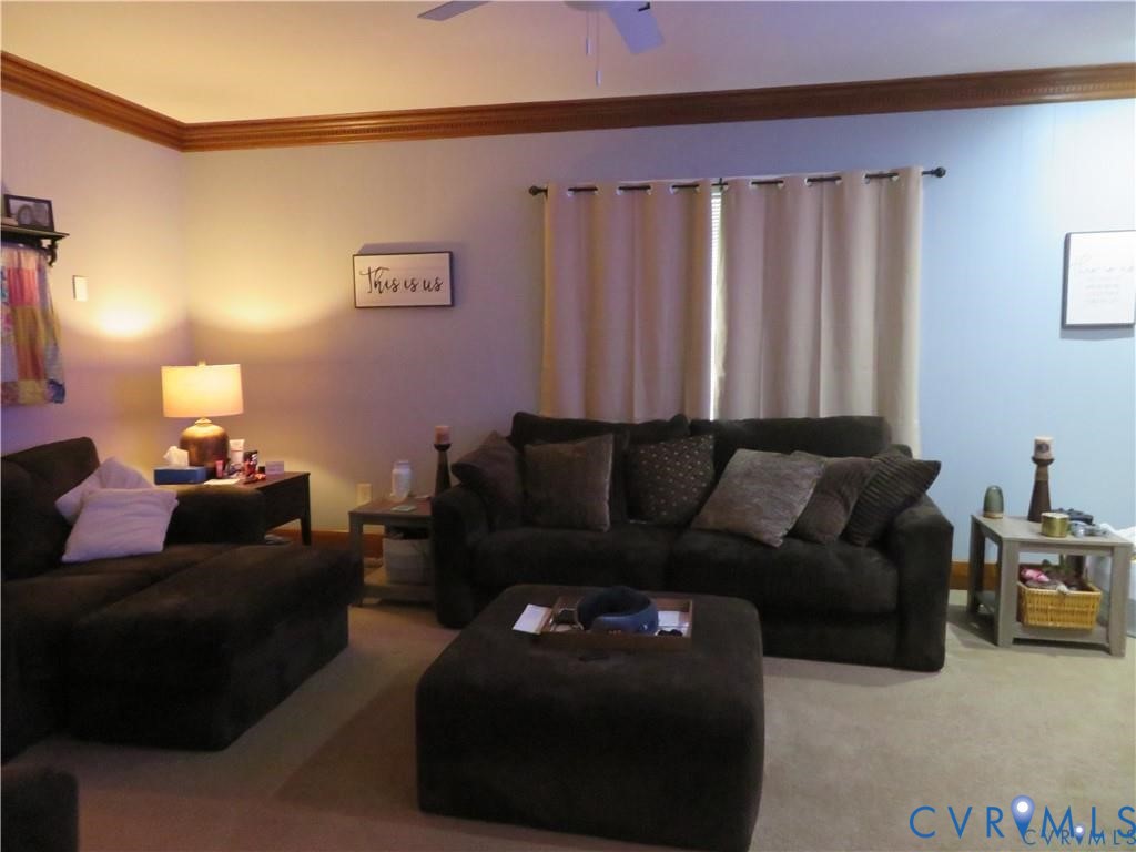 5900 River Road Petersburg, VA 23803 - Photo 21 of 44 a living room with furniture and a couch