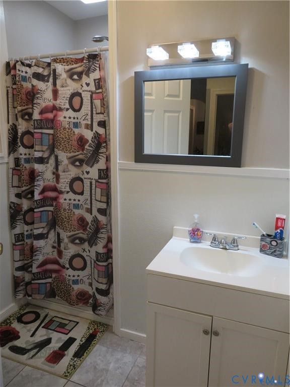 5900 River Road Petersburg, VA 23803 - Photo 23 of 44 a bathroom with a sink and a mirror