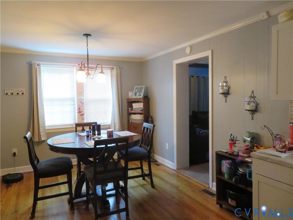 5900 River Road Petersburg, VA 23803 - Photo 38 of 44 a view of a dining room with furniture and wooden floor