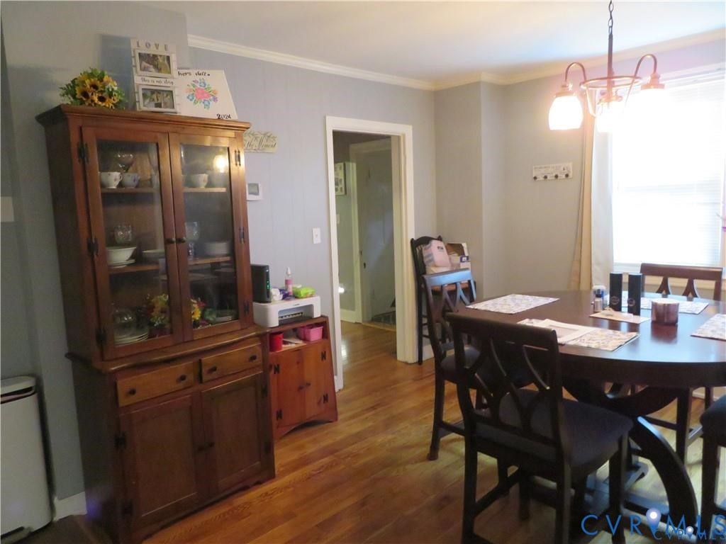 5900 River Road Petersburg, VA 23803 - Photo 39 of 44 a dining room with a table and chairs