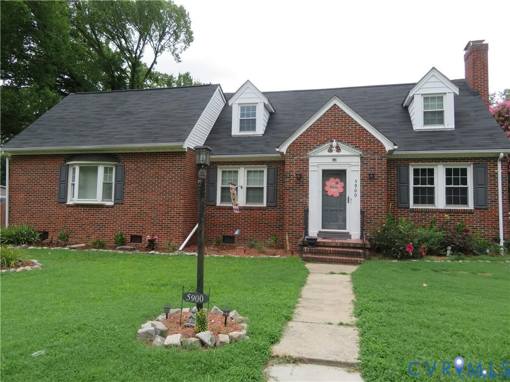 5900 River Road Petersburg, VA 23803 - Photo 5 of 44 a front view of a house with a yard and green space