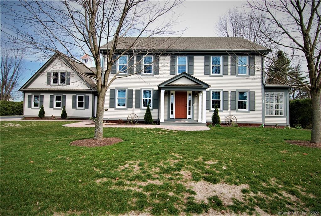 167 Abbe Road Enfield, CT 06082 - Photo 1 of 1 a front view of a house with a yard