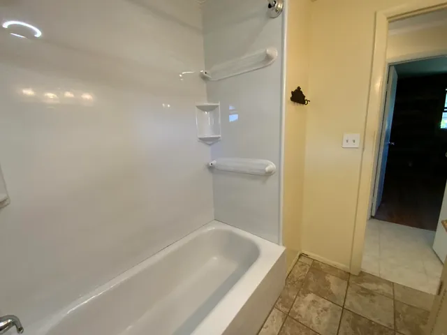 a bathroom with a bathtub