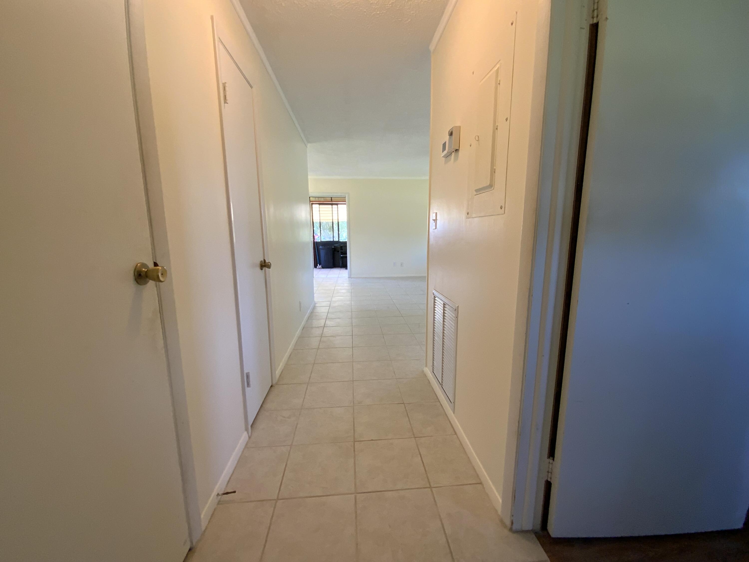 1095 Chobee Loop Okeechobee, FL 34974 - Photo 33 of 46 a view of a hallway