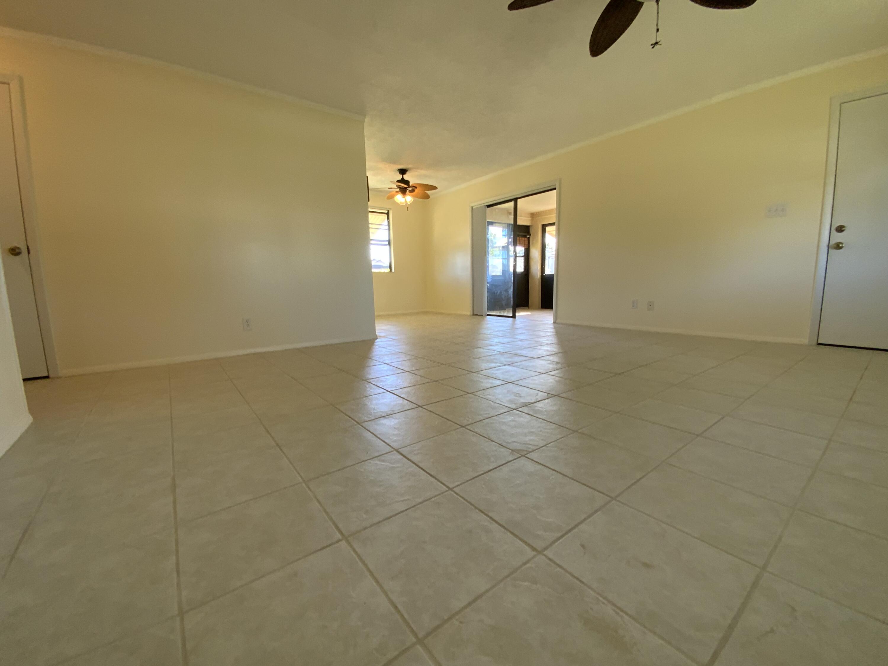 1095 Chobee Loop Okeechobee, FL 34974 - Photo 39 of 46 a view of hallway with a window