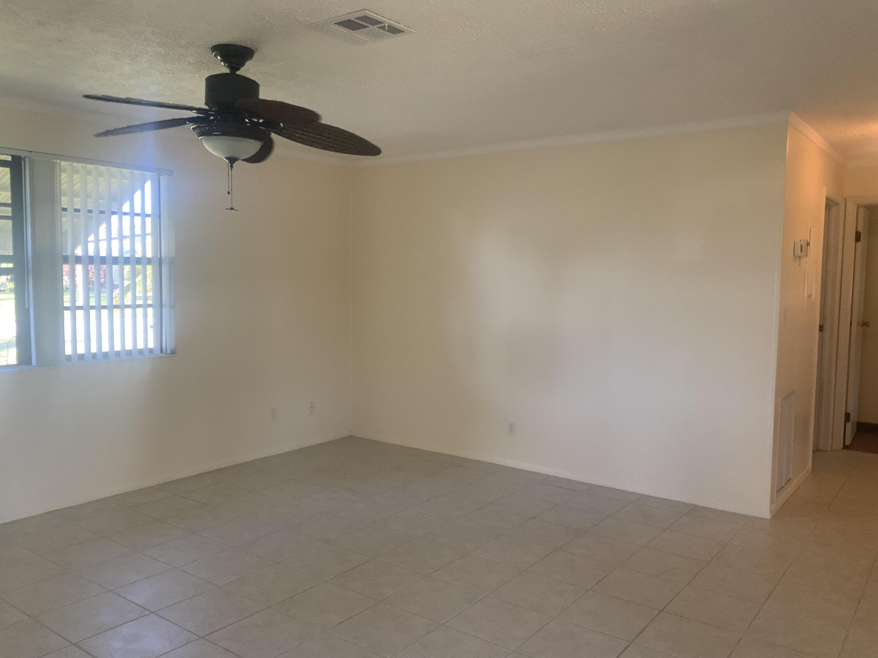 1095 Chobee Loop Okeechobee, FL 34974 - Photo 46 of 46 a view of an empty room with a window