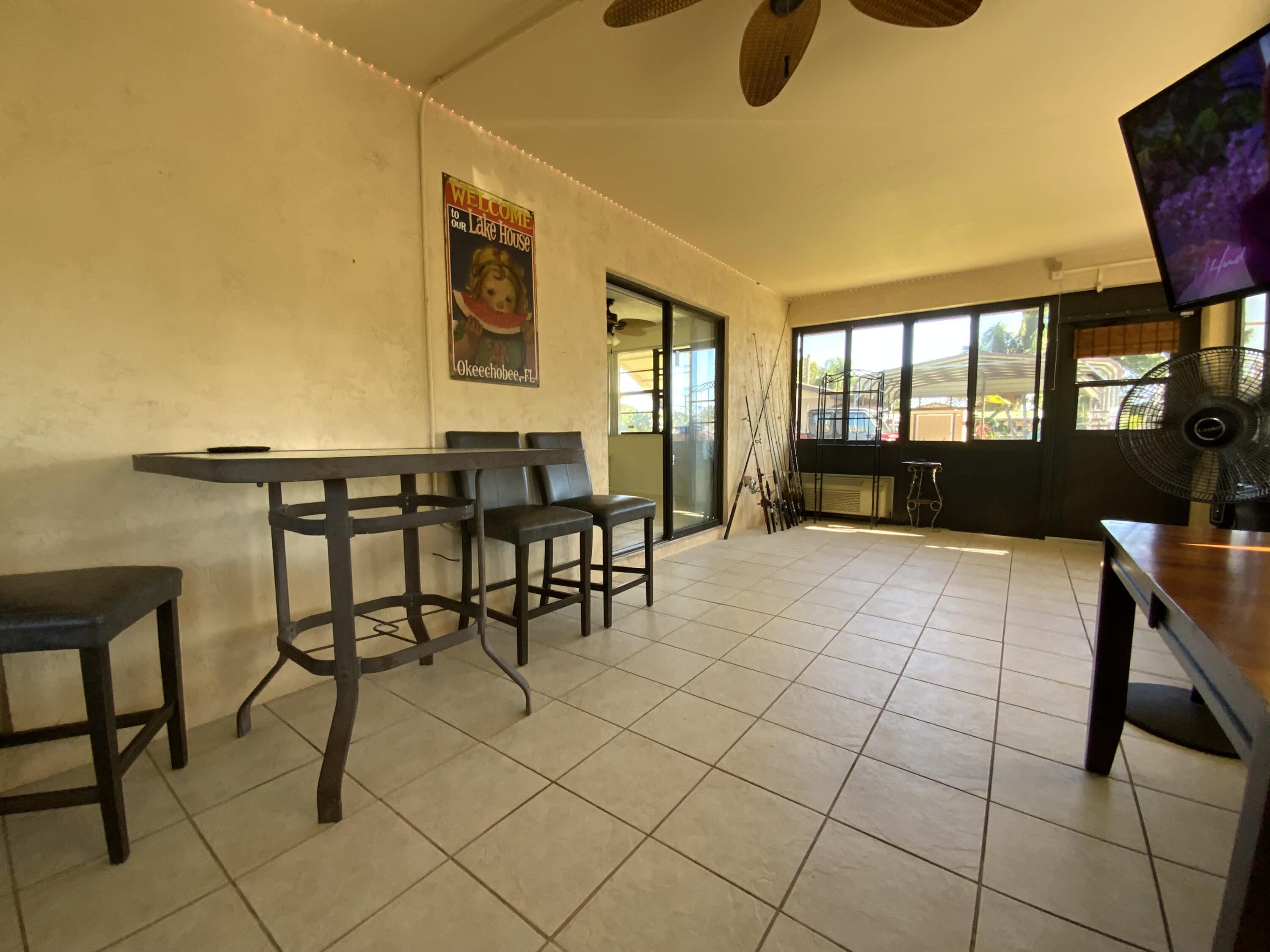 1095 Chobee Loop Okeechobee, FL 34974 - Photo 7 of 46 a living room with furniture