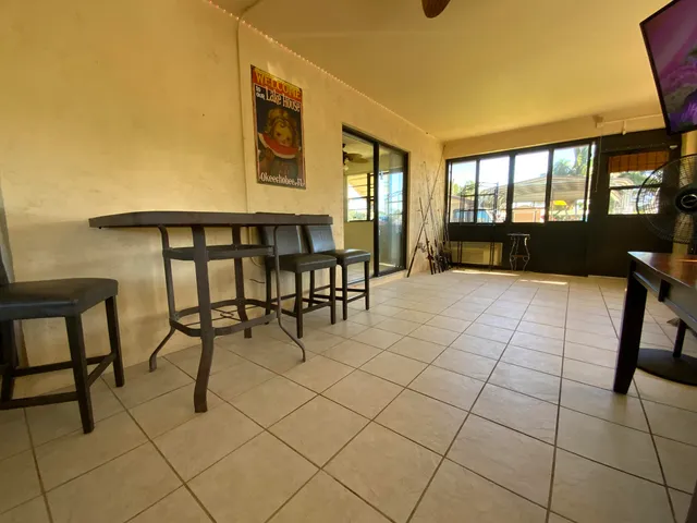 a view of a lobby with furniture and windows