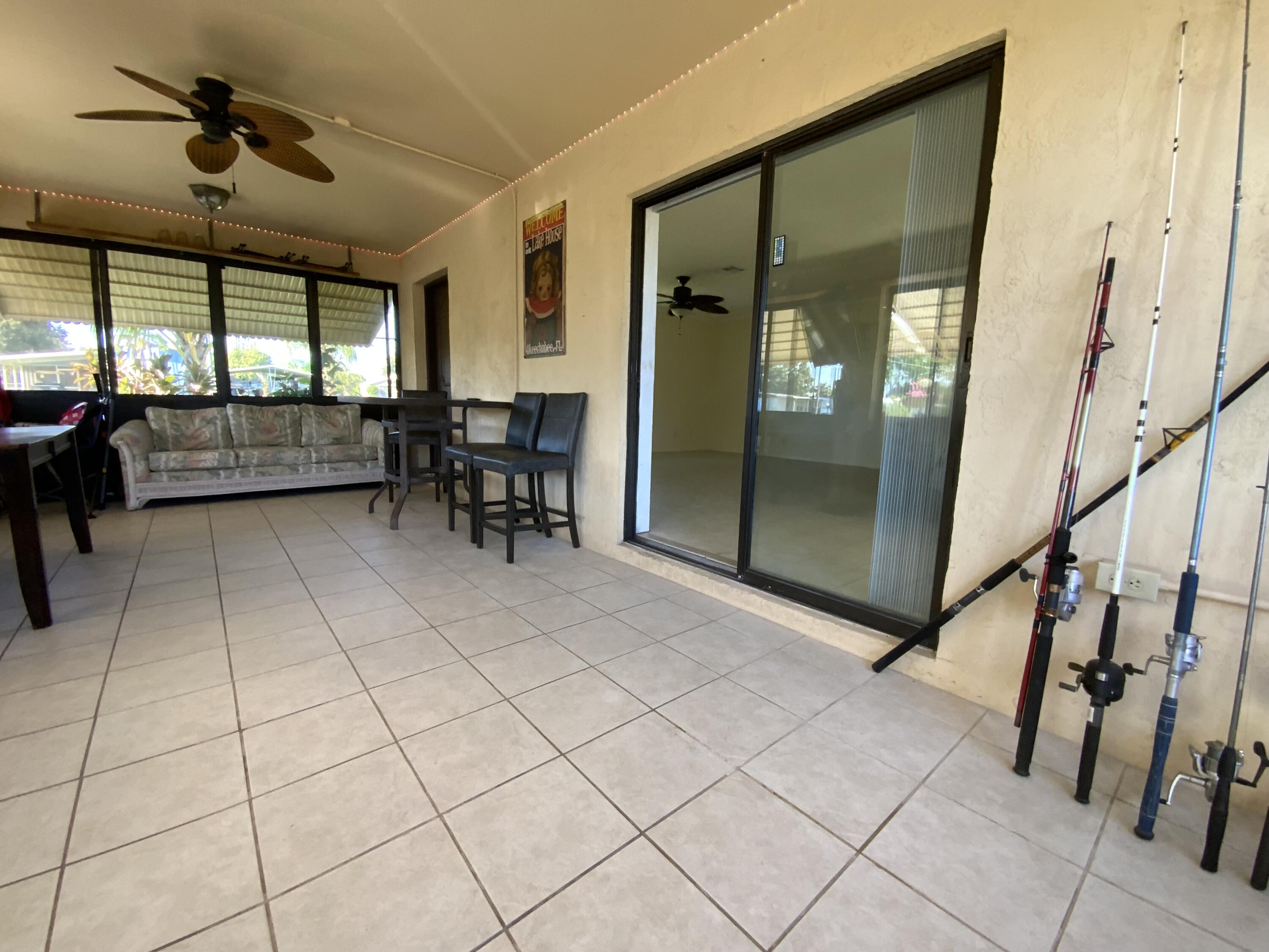 1095 Chobee Loop Okeechobee, FL 34974 - Photo 10 of 46 a view of a livingroom with furniture