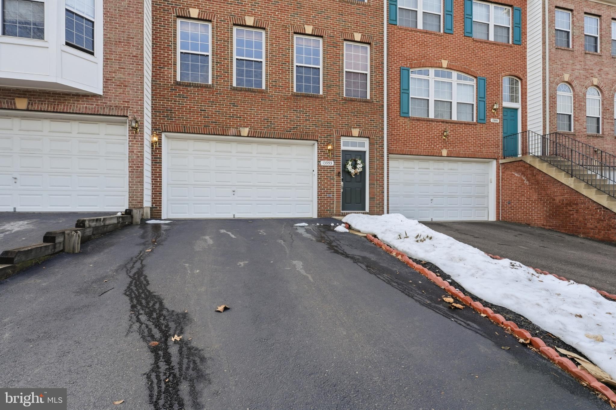 13993 Sawteeth Way Centreville, VA 20121 - Photo 2 of 44 a view of a house with many windows