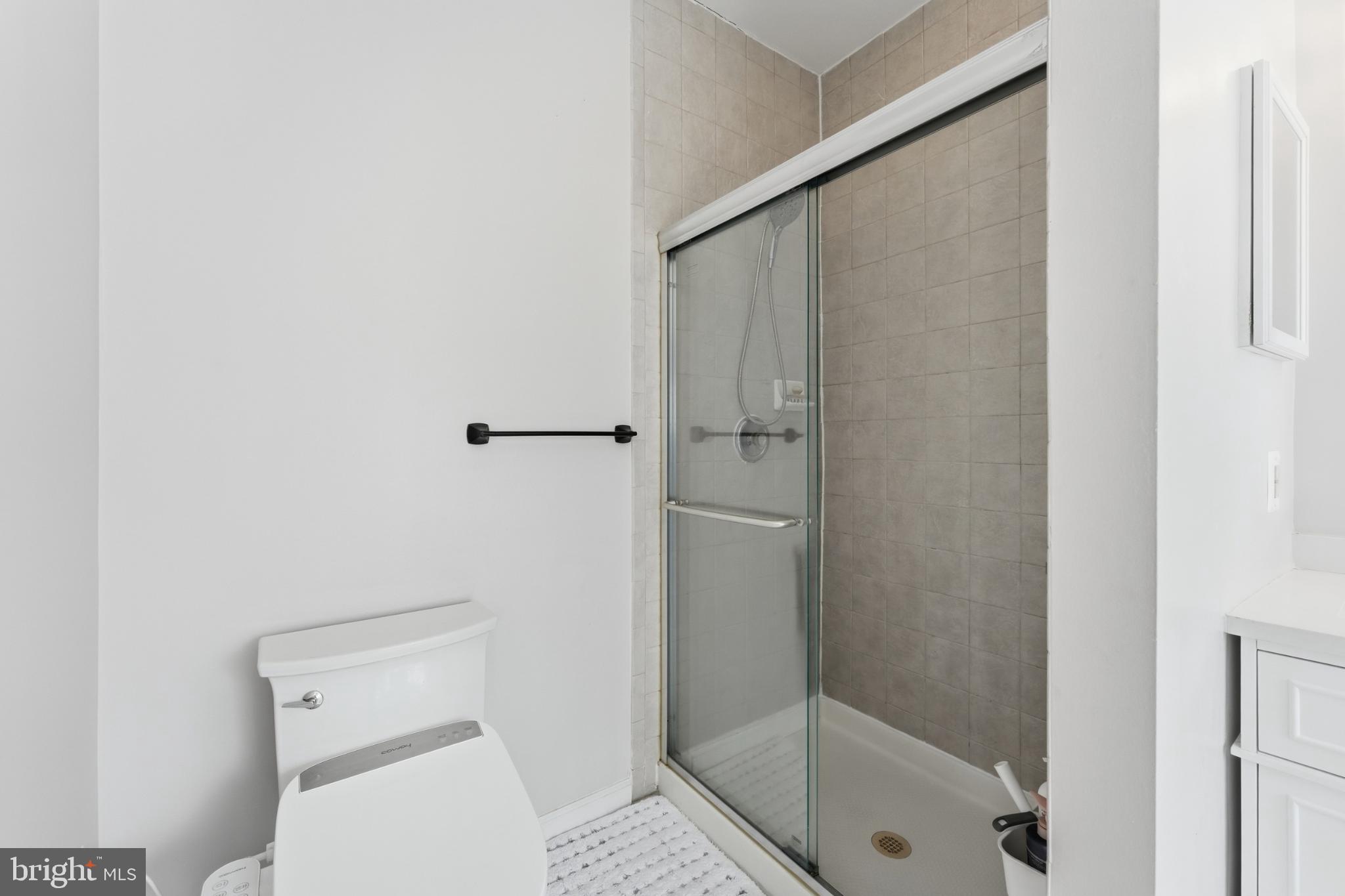 13993 Sawteeth Way Centreville, VA 20121 - Photo 26 of 44 a bathroom with a shower and toilet