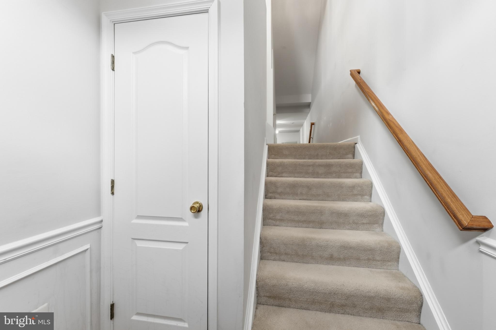 13993 Sawteeth Way Centreville, VA 20121 - Photo 3 of 44 a view of staircase with white walls