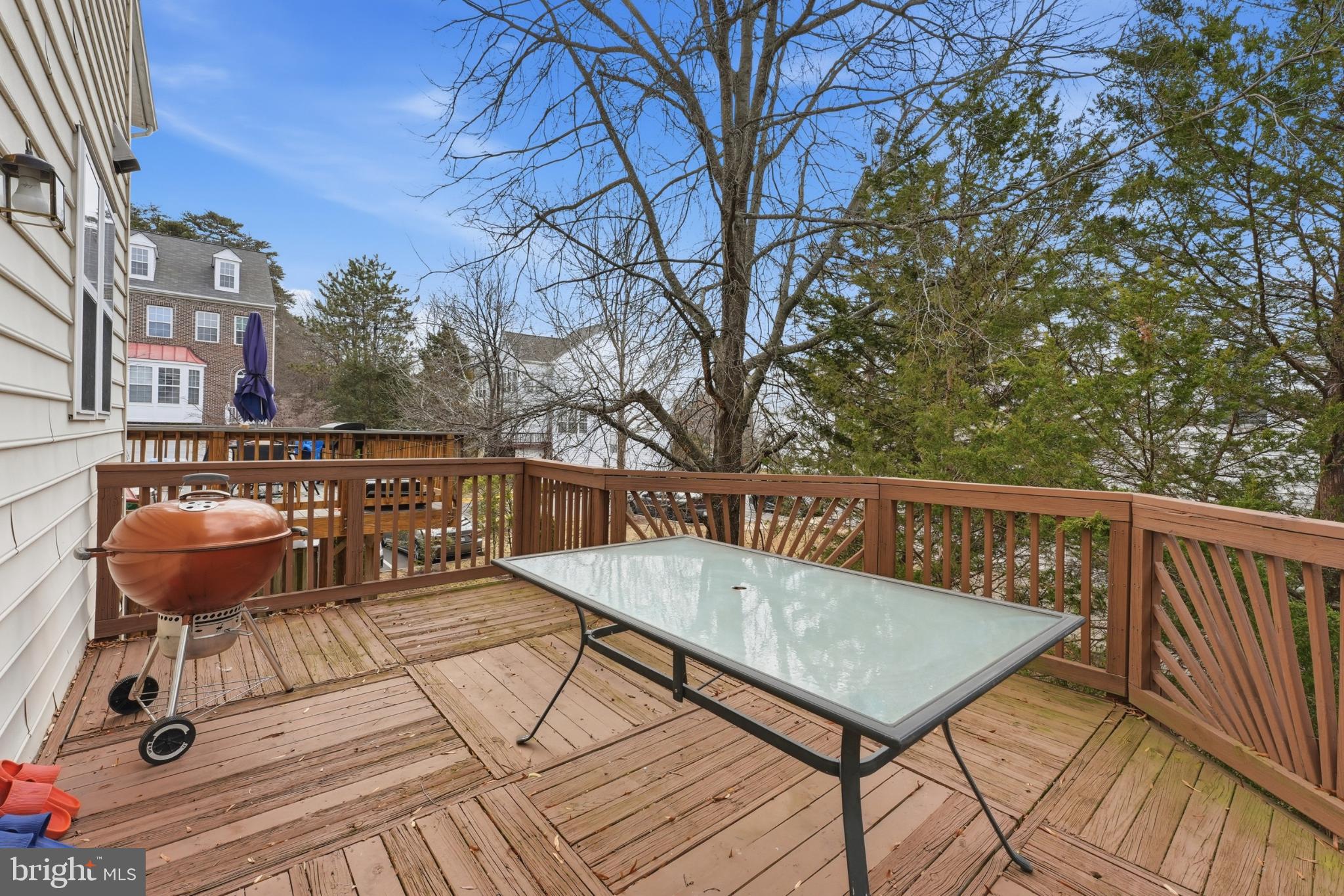 13993 Sawteeth Way Centreville, VA 20121 - Photo 37 of 44 a view of balcony with wooden floor and outdoor seating