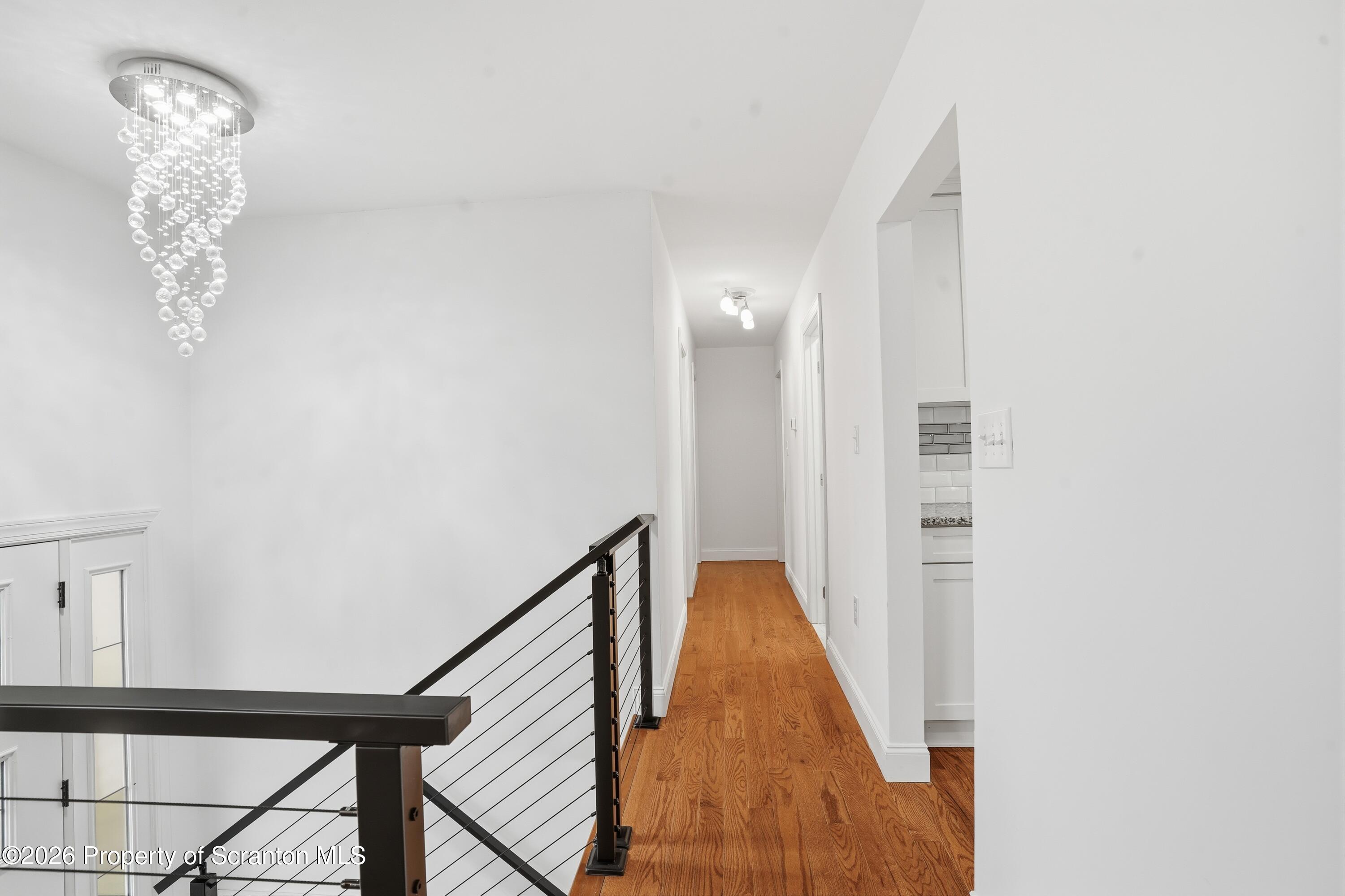 16204 Highway 407 Factoryville, PA 18419 - Photo 43 of 74 a view of a hallway with windows