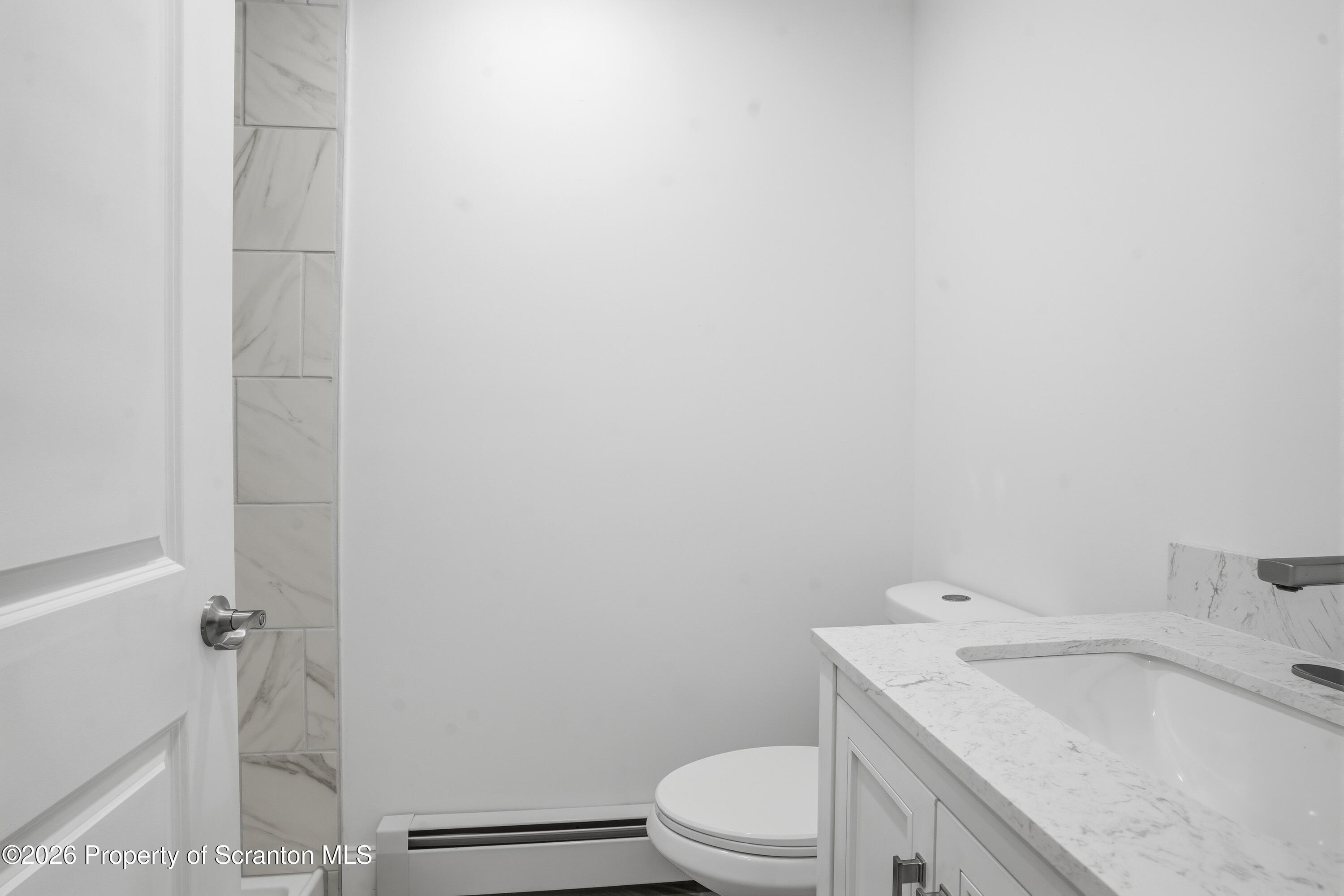 16204 Highway 407 Factoryville, PA 18419 - Photo 44 of 74 a bathroom with a sink and toilet