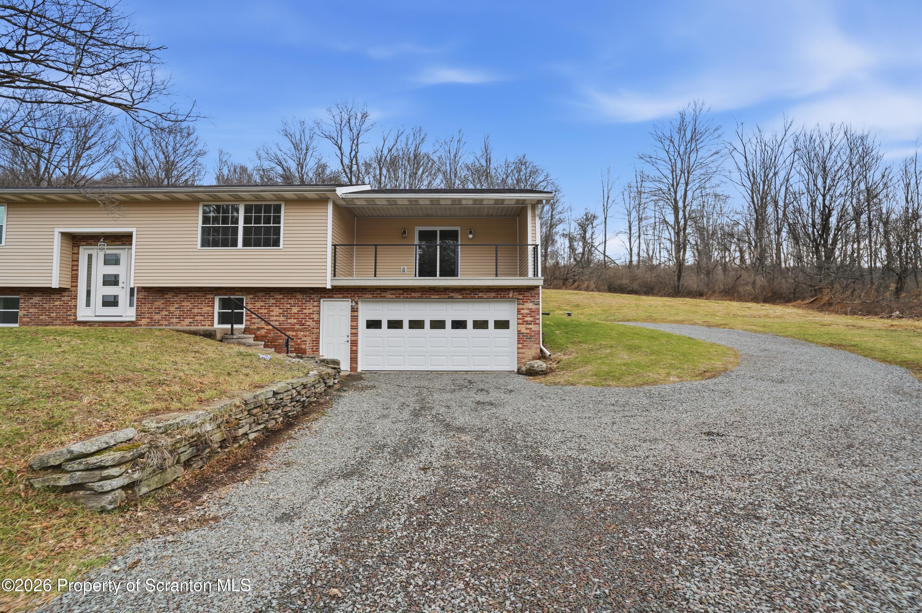 16204 Highway 407 Factoryville, PA 18419 - Photo 68 of 74 a view of a house with backyard and trees