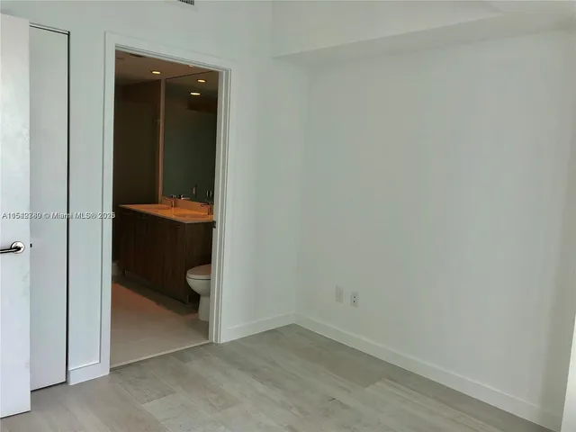 an empty room and a sink