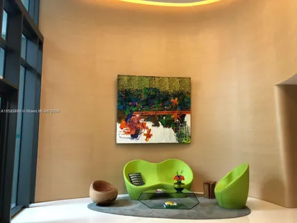 a view of a swimming pool with a lounge chairs