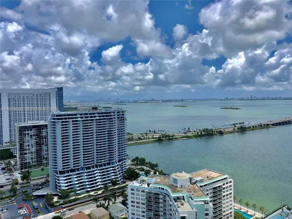 a view of a lake with a city view