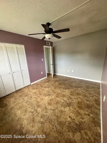 a view of an entryway with a rug