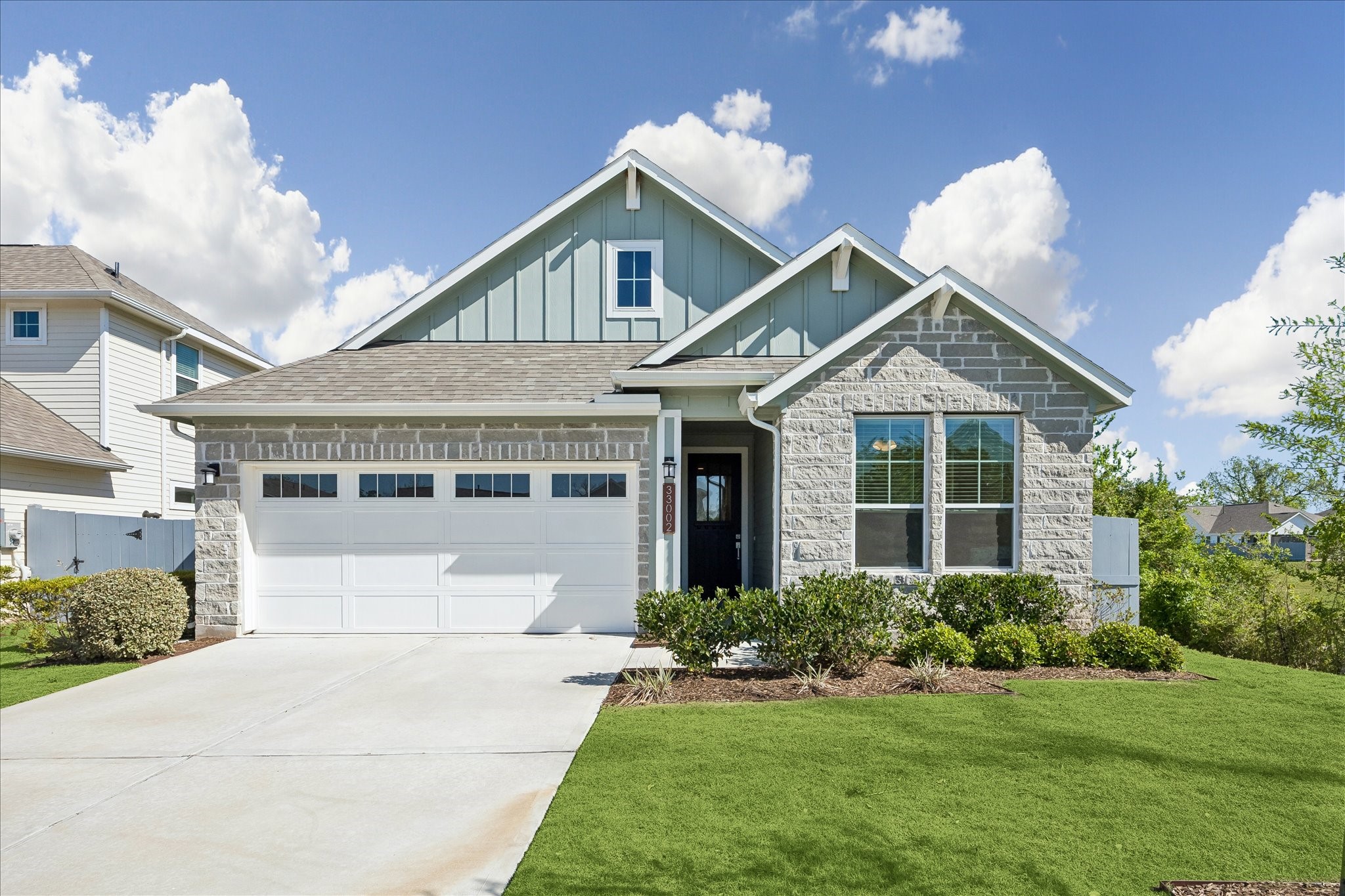 33002 Carolyns Perfection Loop Fulshear, TX 77441 - Photo 1 of 29 a front view of a house with a yard