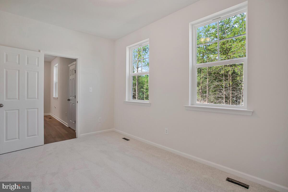900 Walnut Avenue North Beach, MD 20714 - Photo 19 of 82 an empty room with windows