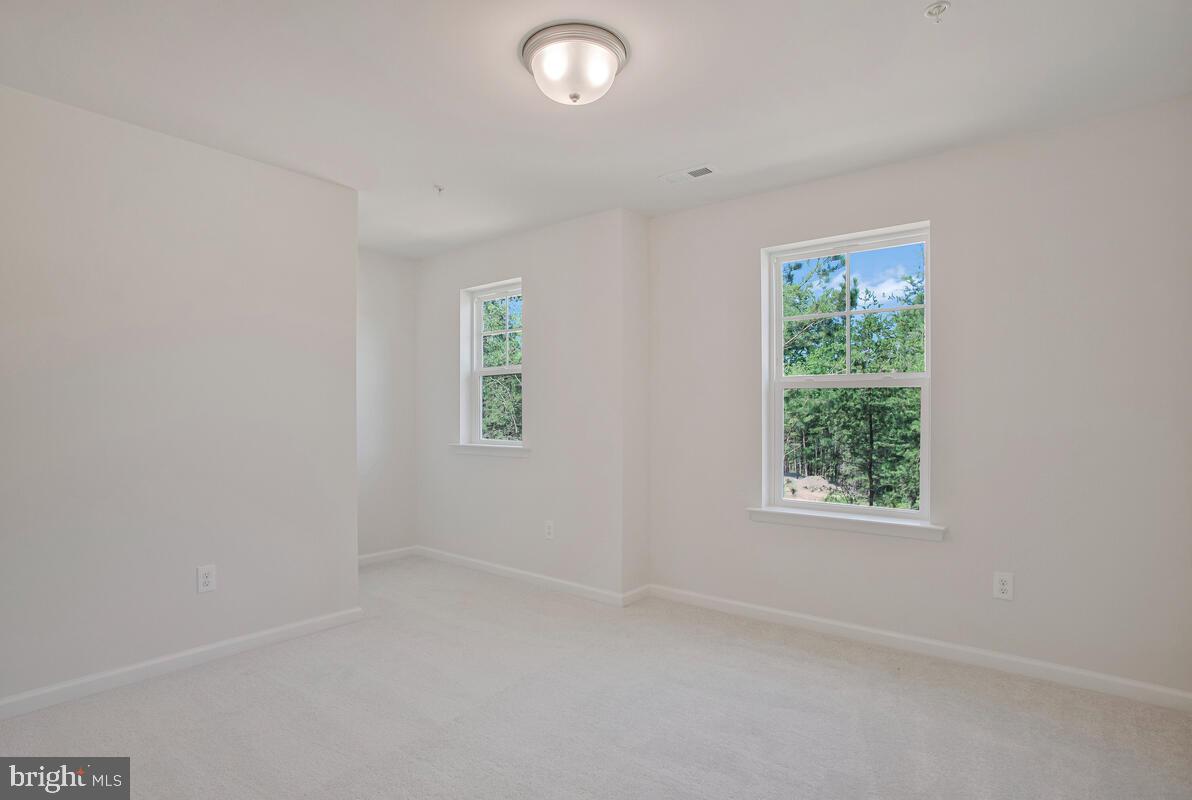 900 Walnut Avenue North Beach, MD 20714 - Photo 21 of 82 an empty room with a window