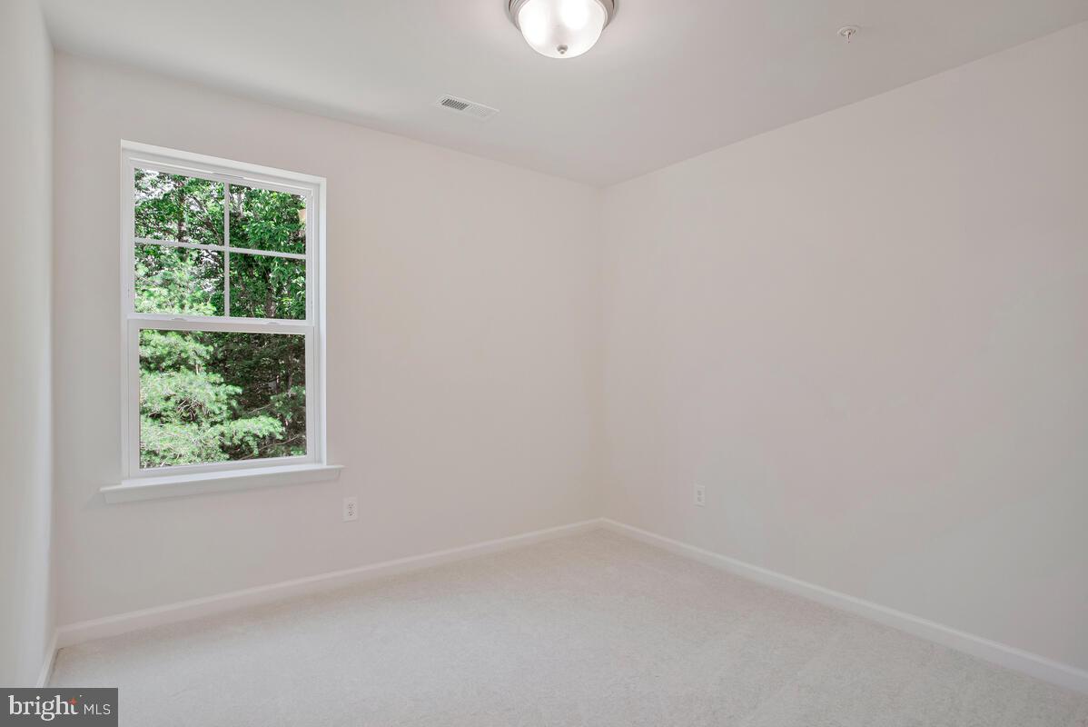 900 Walnut Avenue North Beach, MD 20714 - Photo 26 of 82 an empty room with a window