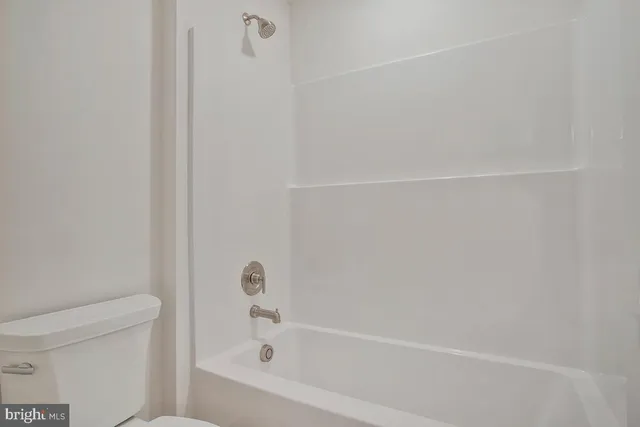 a view of a room with water view and mountain view