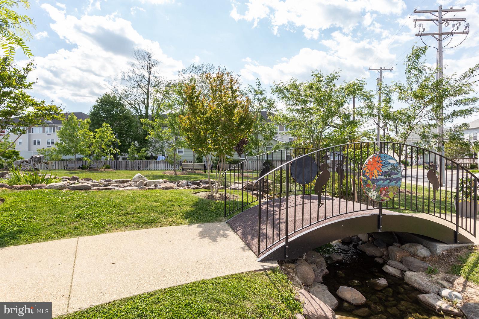 900 Walnut Avenue North Beach, MD 20714 - Photo 67 of 82 a view of a backyard with iron fence