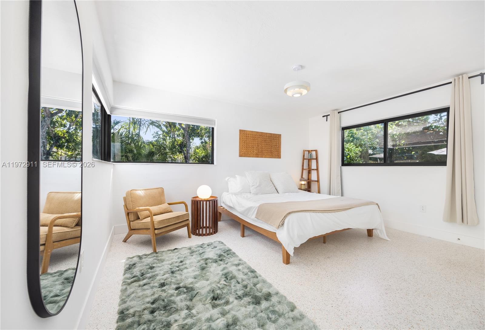 1860 Southwest 13th Street Miami, FL 33145 - Photo 11 of 21 a living room with a bed furniture and a window
