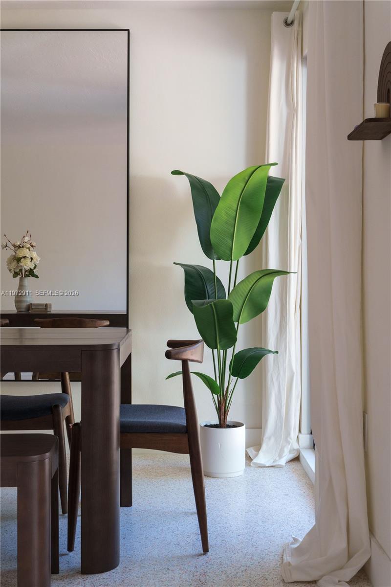 1860 Southwest 13th Street Miami, FL 33145 - Photo 18 of 21 a vase of flowers sitting on a table