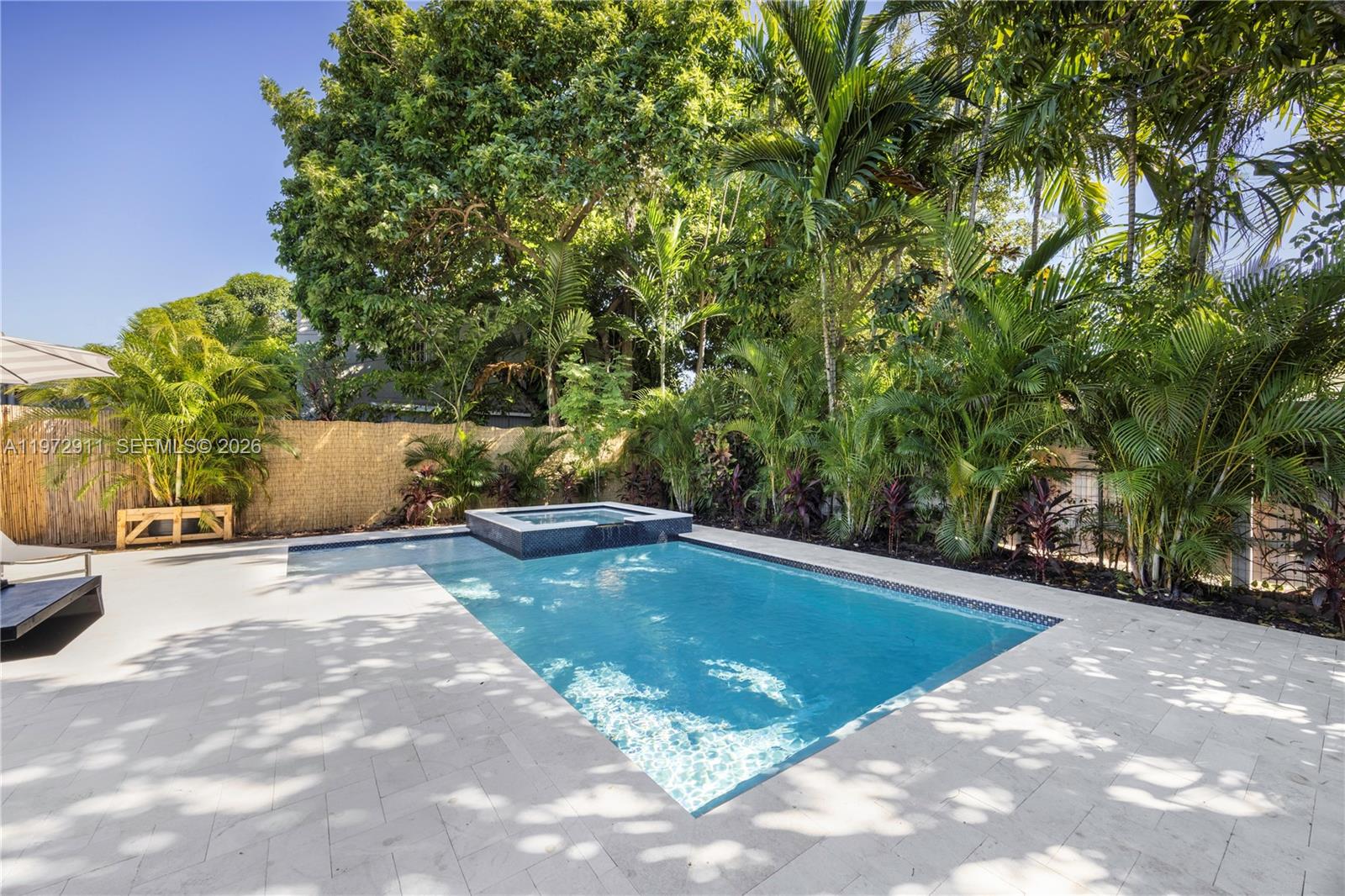 1860 Southwest 13th Street Miami, FL 33145 - Photo 7 of 21 a view of a swimming pool with an outdoor space