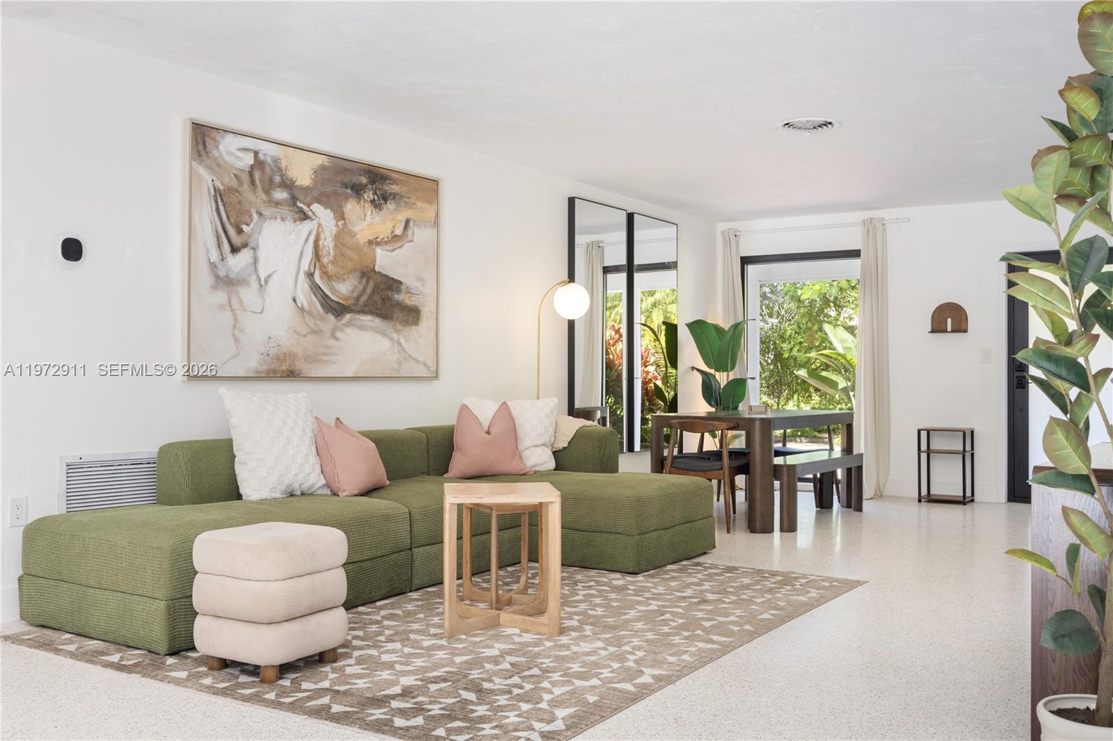 1860 Southwest 13th Street Miami, FL 33145 - Photo 10 of 21 a living room with furniture and a large window