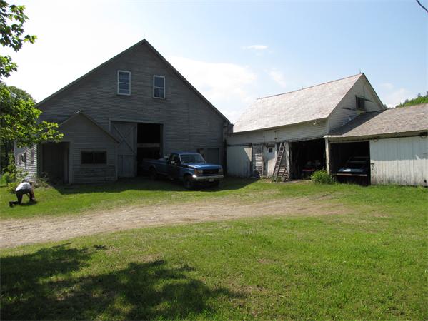 497 Adamsville Road Colrain, MA 01340 - Photo 6 of 28 a front view of a house with a garden