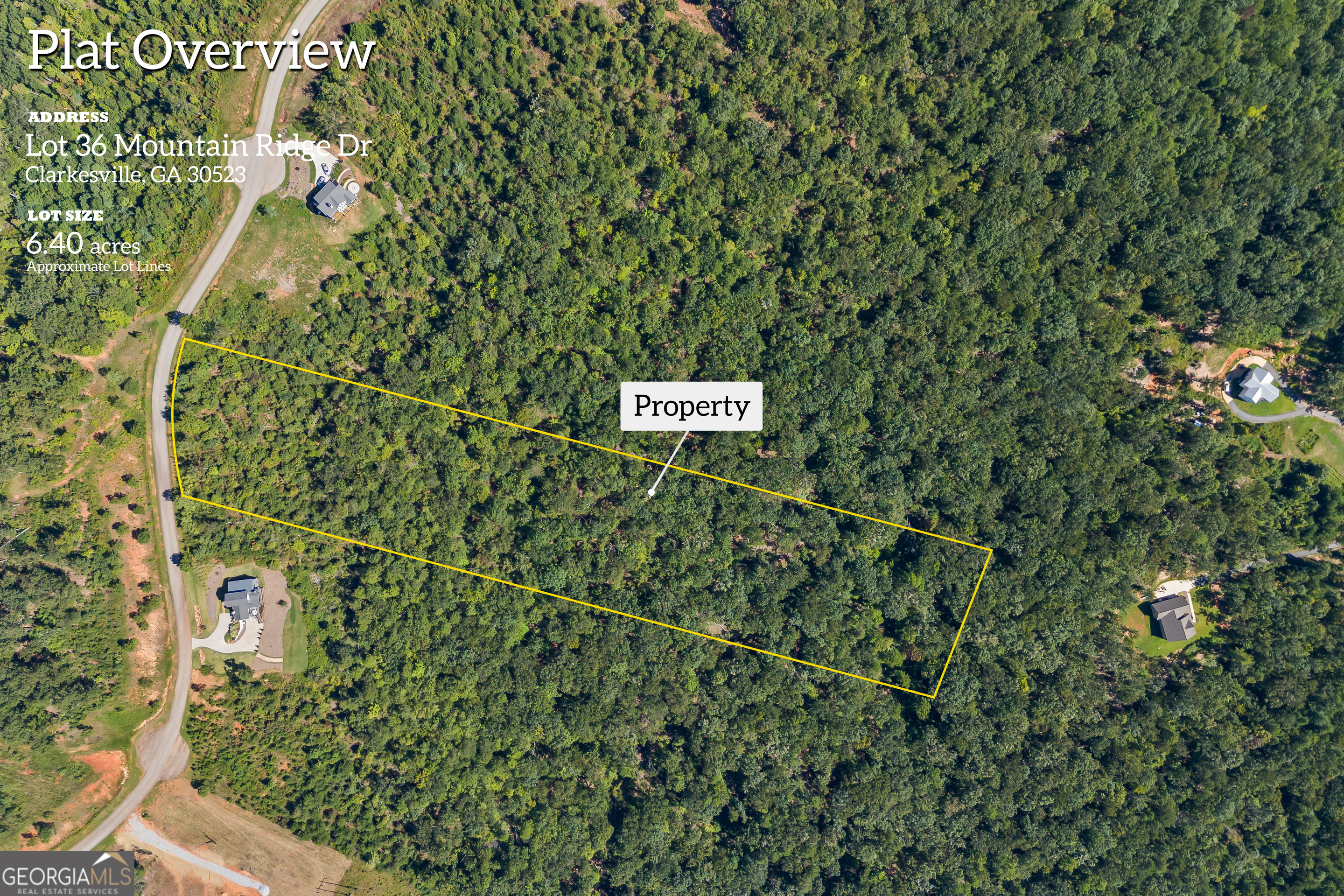 Lot 36 Mountain Ridge Drive Clarkesville, GA 30523 - Photo 2 of 35 a sign that is sitting in front of a tree