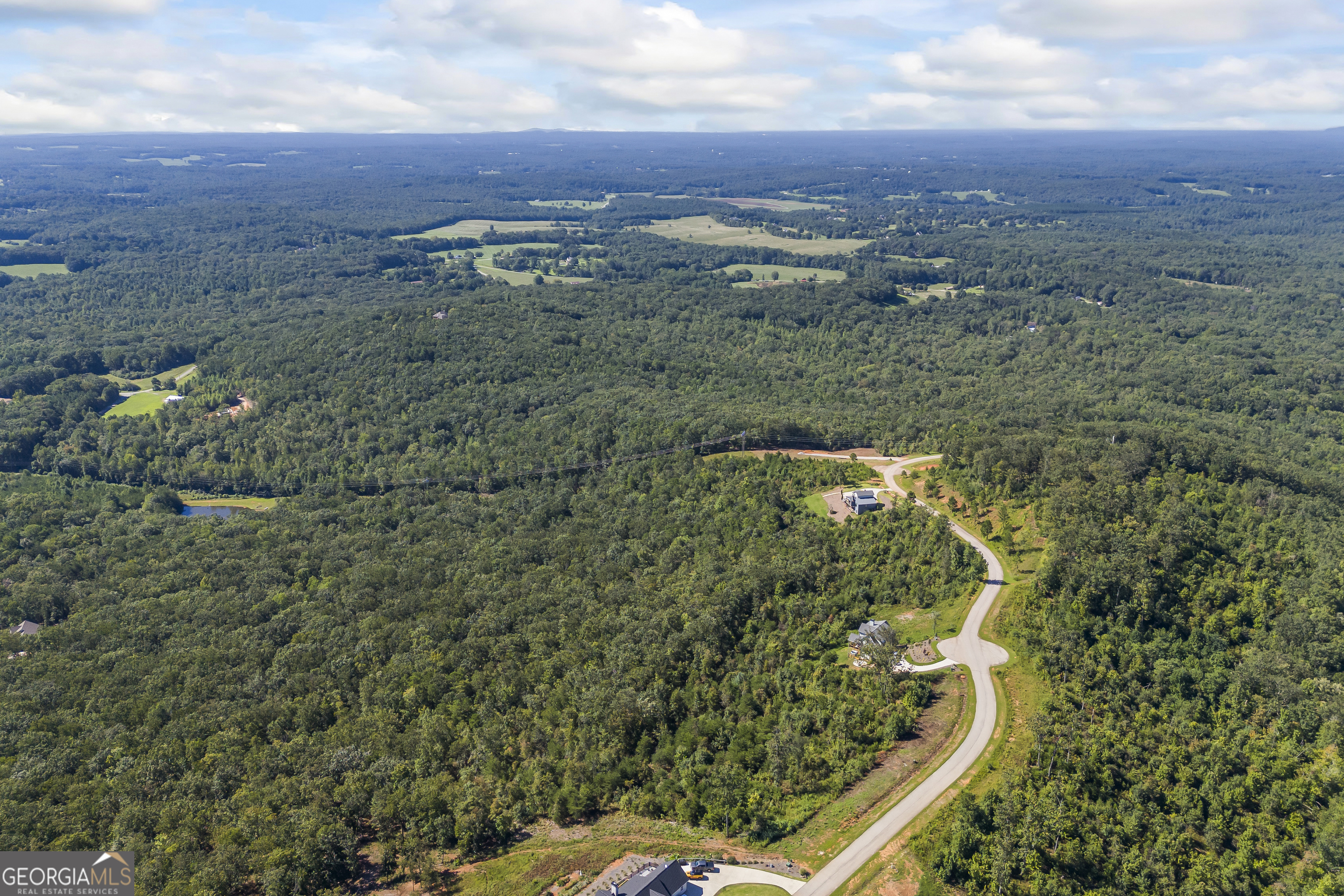 Lot 36 Mountain Ridge Drive Clarkesville, GA 30523 - Photo 10 of 35 an aerial view of a house with a yard