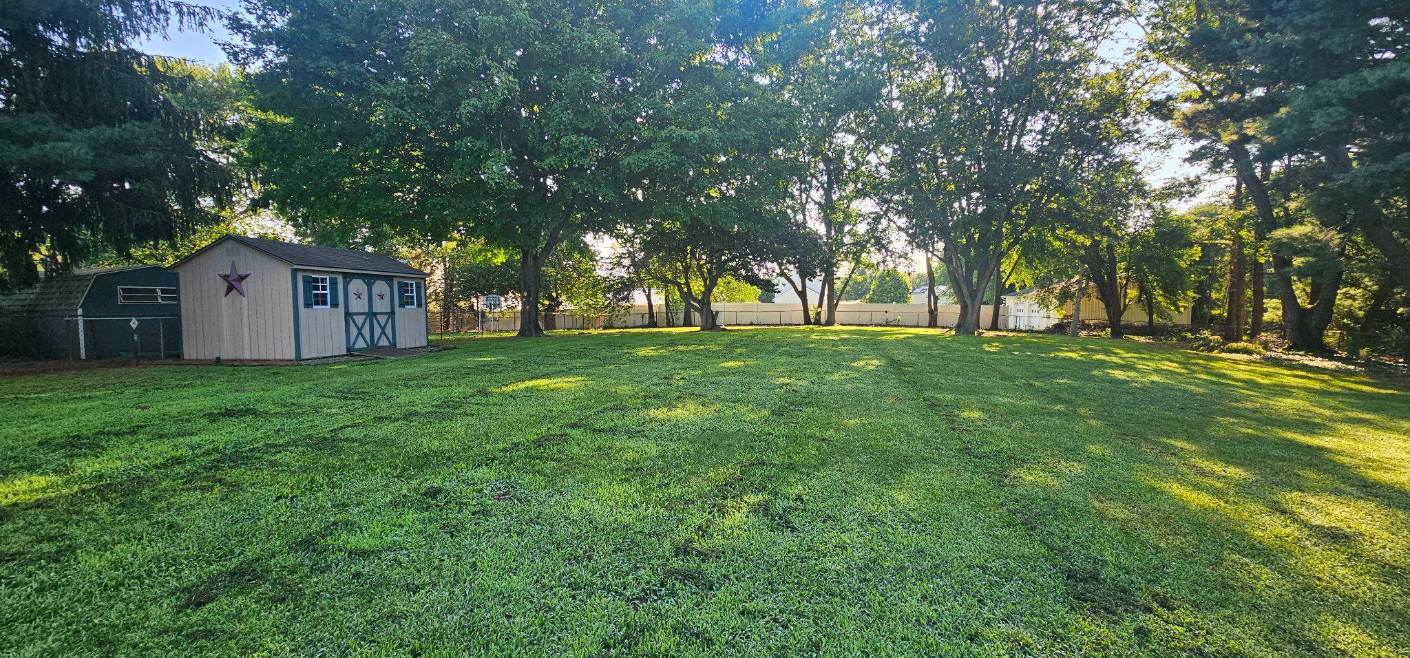 65 Randolph Road Bridgeton, NJ 08302 - Photo 3 of 29 Beautiful backyard with cottage-style barn shed
