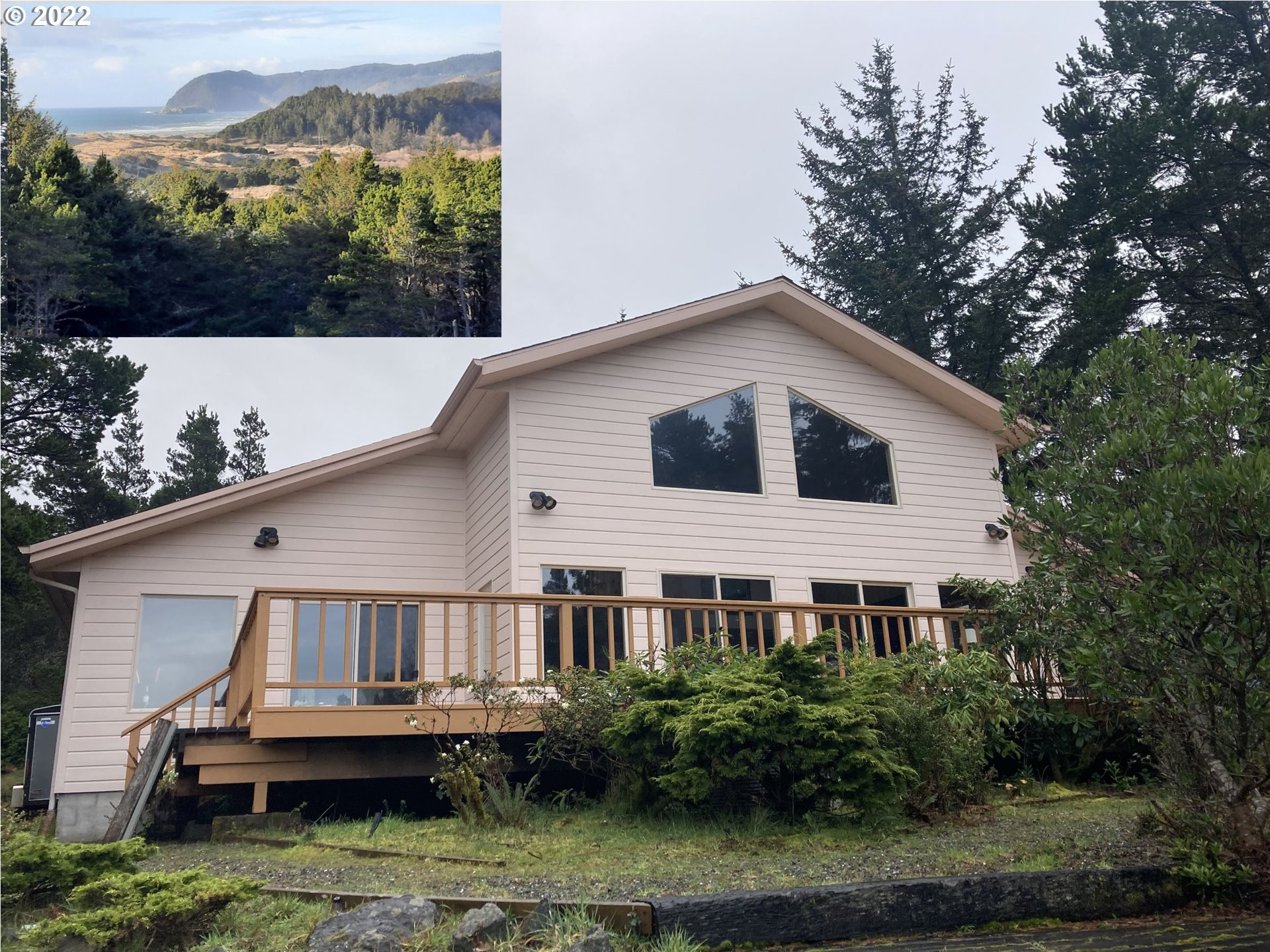 24010 Carpenterville Road Brookings, OR 97415 - Photo 1 of 1 a view of a house with roof deck
